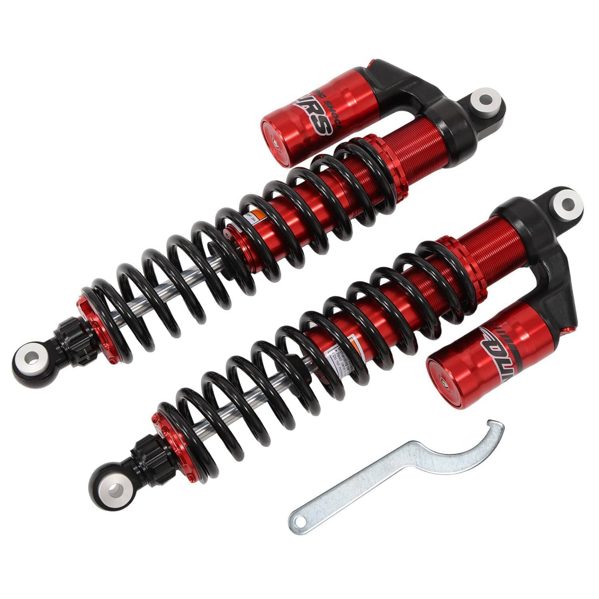 Red and black coil shock absorbers set shown from an angled side view