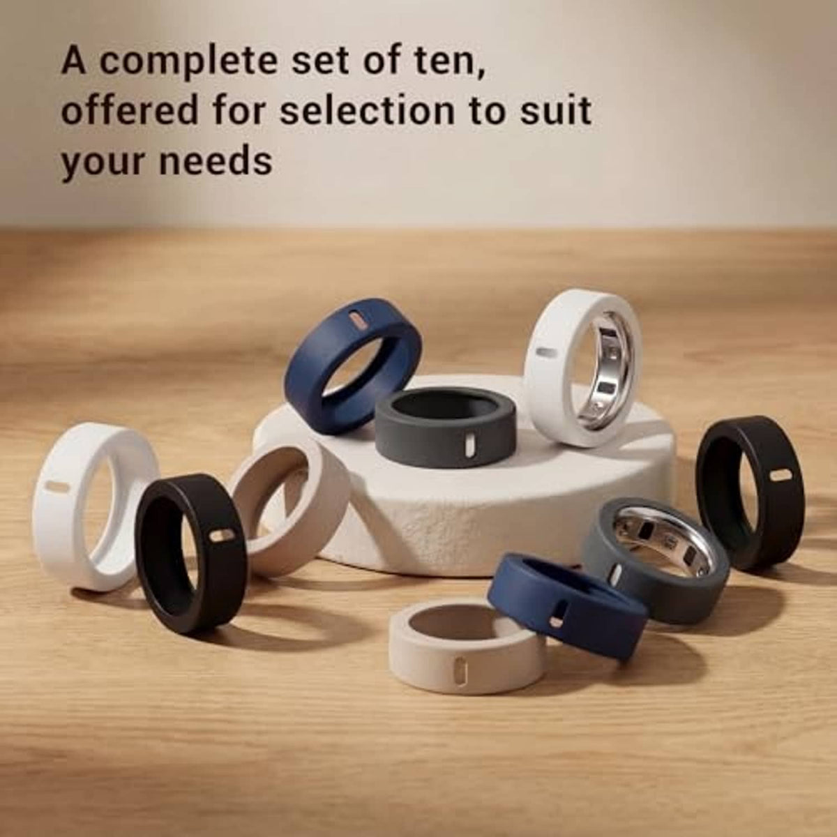 Complete set of ten silicone ring charging covers in mixed colors on a small base