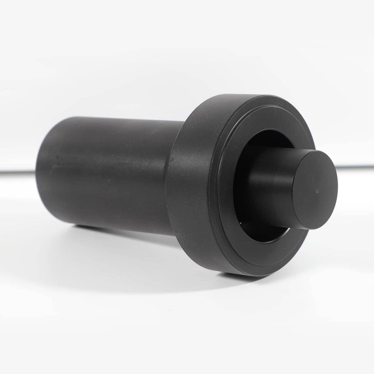 Cylindrical black output seal driver with circular face and small round center cap