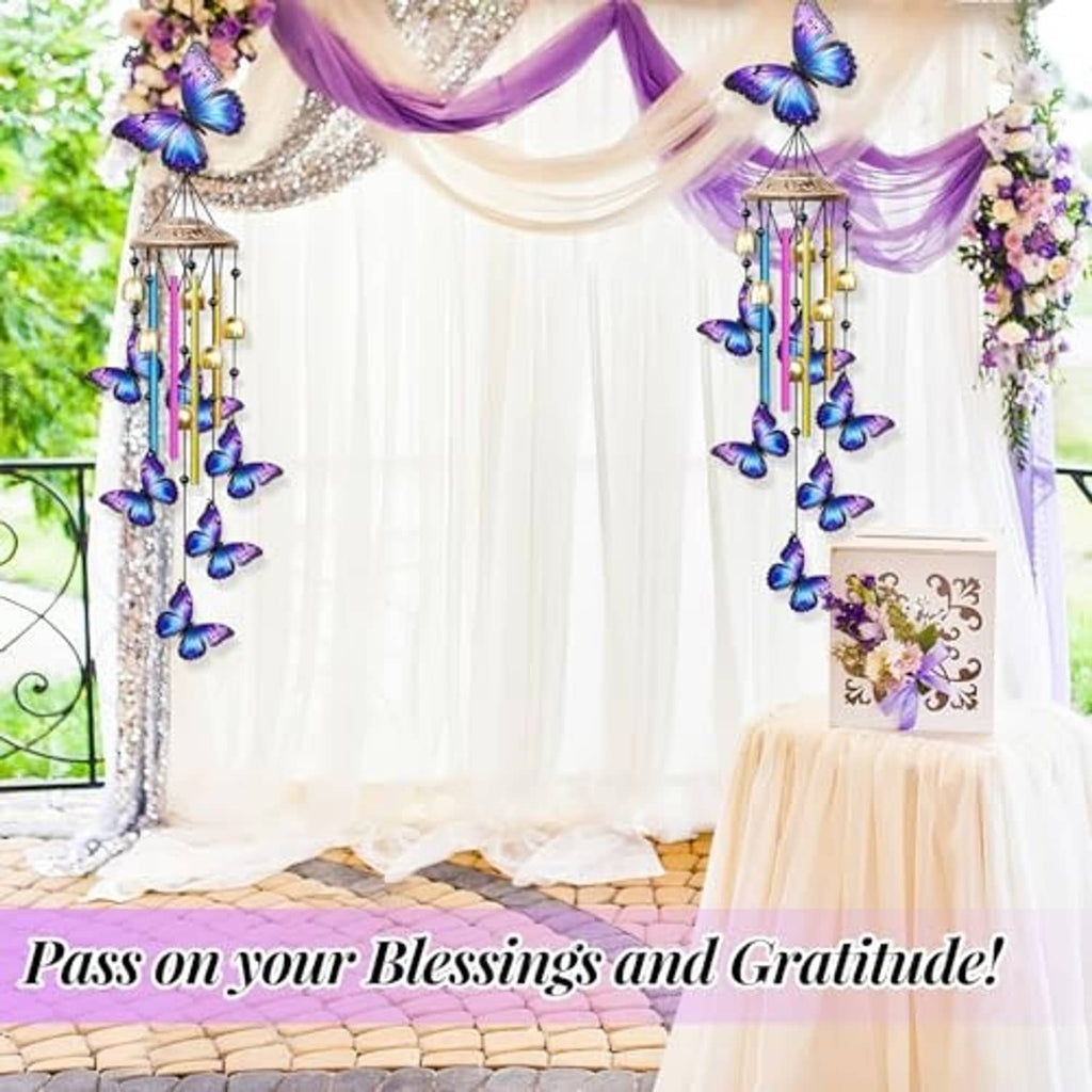 Pair of butterfly wind chimes with purple-blue butterflies, rainbow tubes, and gold bells