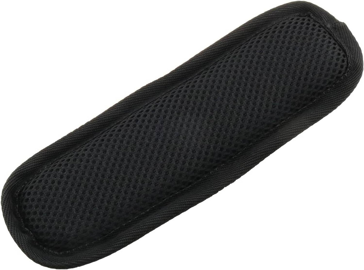 Black luggage shoulder strap pad with textured surface and segmented padding along the length