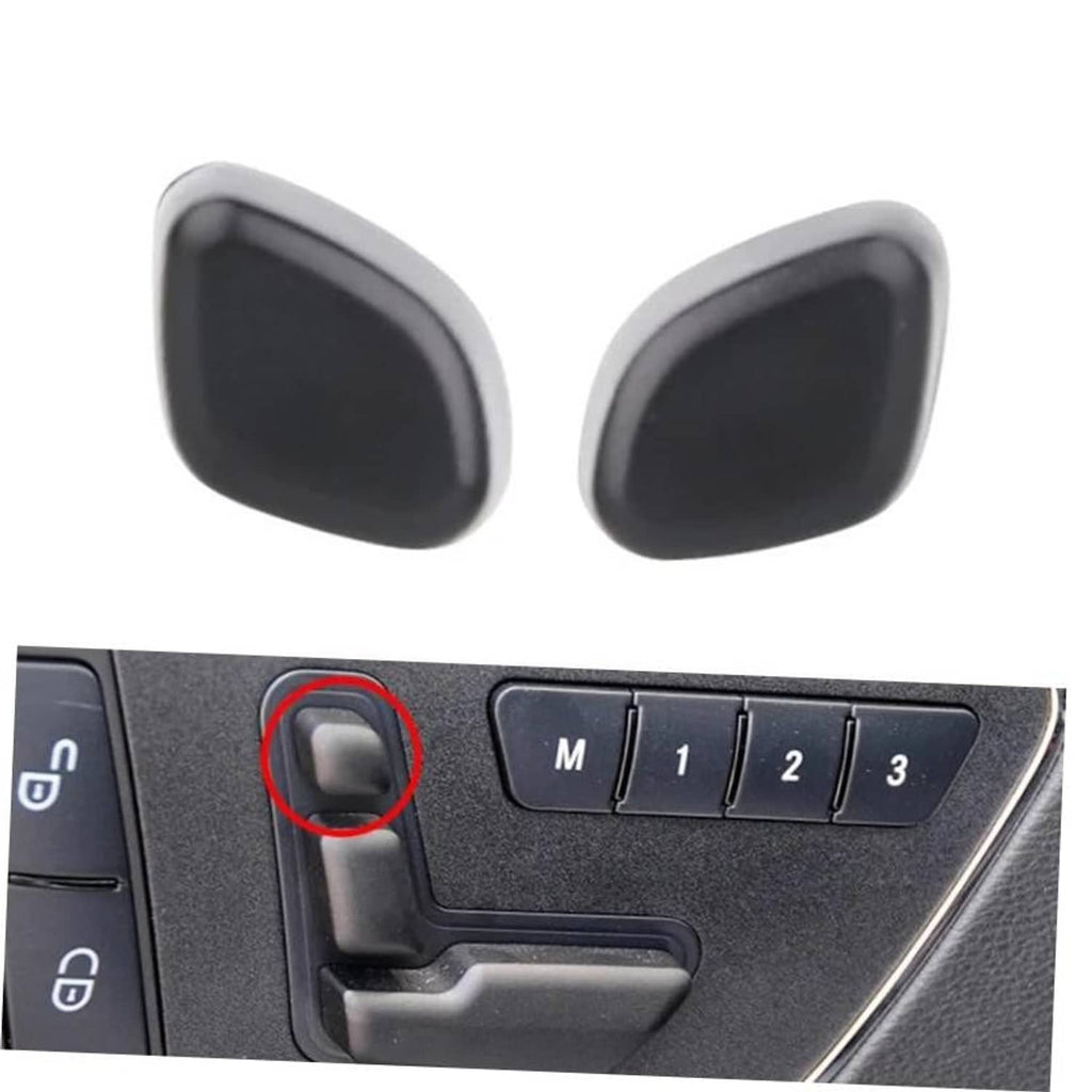 Pair of black headrest adjust switch button covers with light gray trim