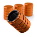 Amber orange aluminum tire valve stem cap set with black rubber insert and knurled grip