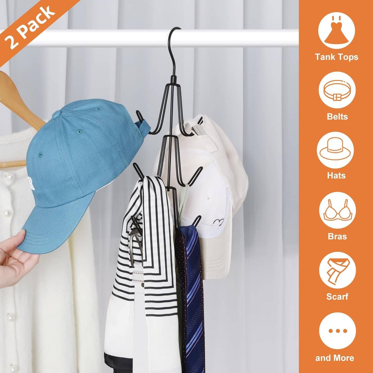 Black purse hanger organizer with five hooks, holding hats and belts on a closet rod