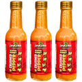 Spur Tree Jamaican scotch bonnet pepper sauce bottles, three glass bottles with red labels