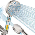 Brushed nickel handheld shower head with round spray face and streaming water