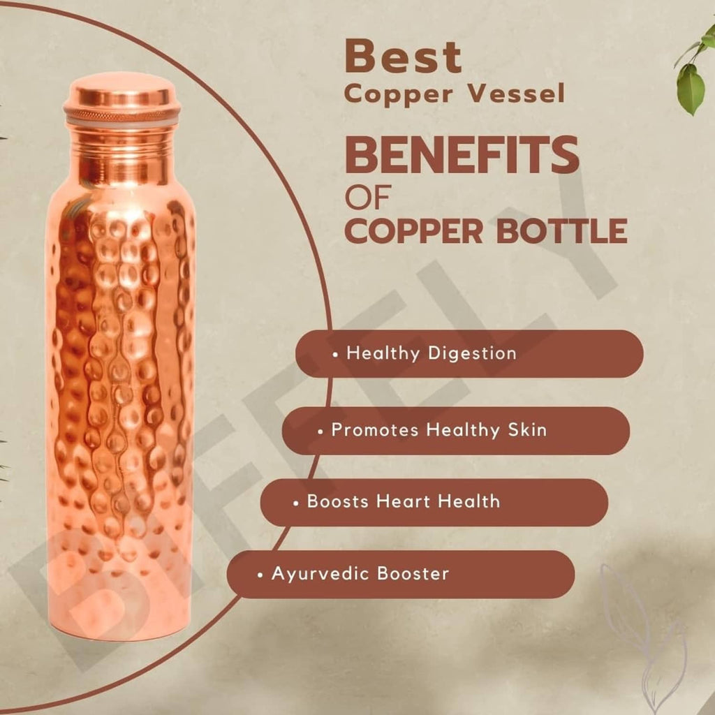 Tall copper water bottle with hammered texture and threaded screw-top cap.
