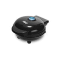 Black electric round griddle with hinged lid and blue power indicator