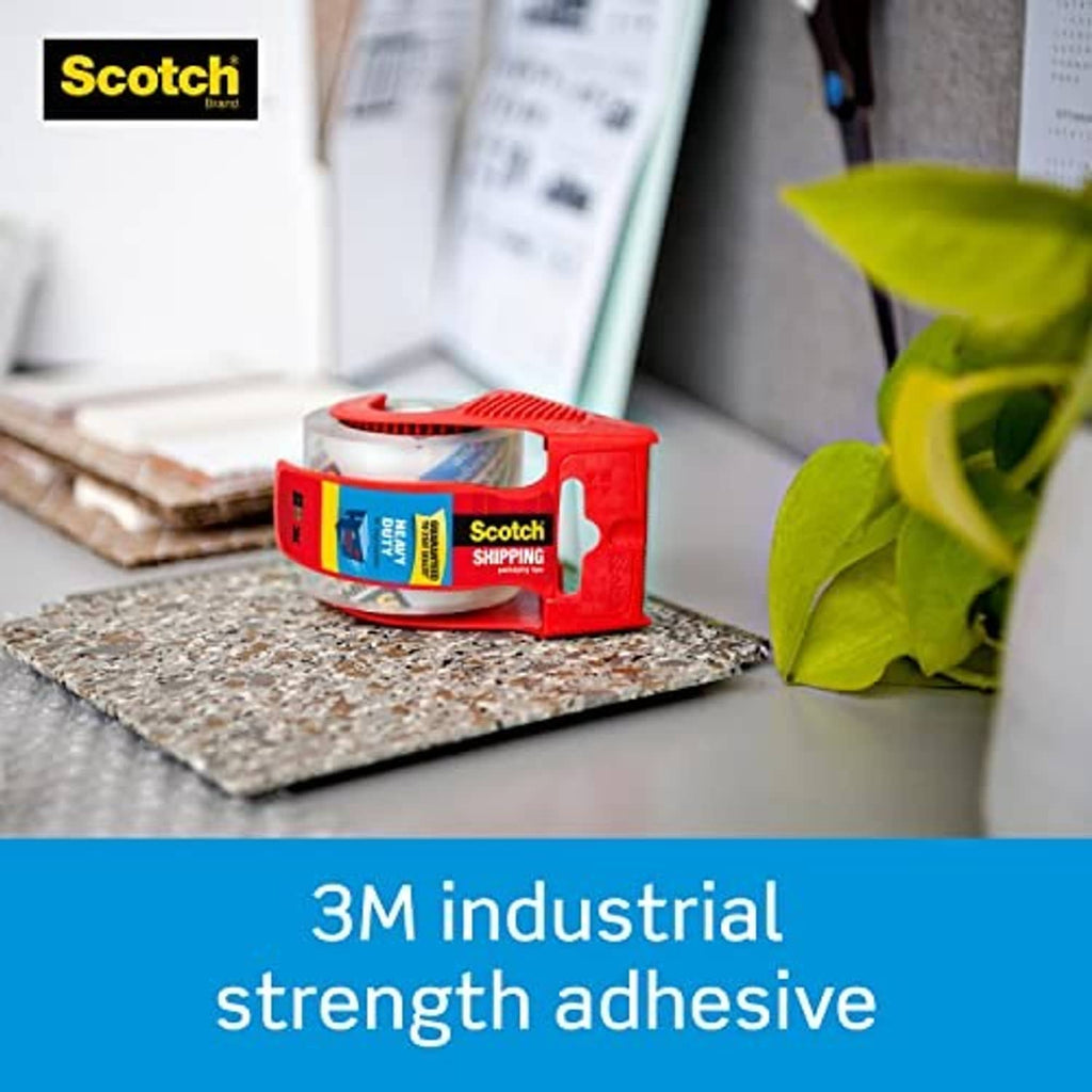 Scotch heavy-duty packaging tape dispenser with red handle and clear tape roll