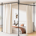 Black room divider curtain rod with cream double curtains and end posts