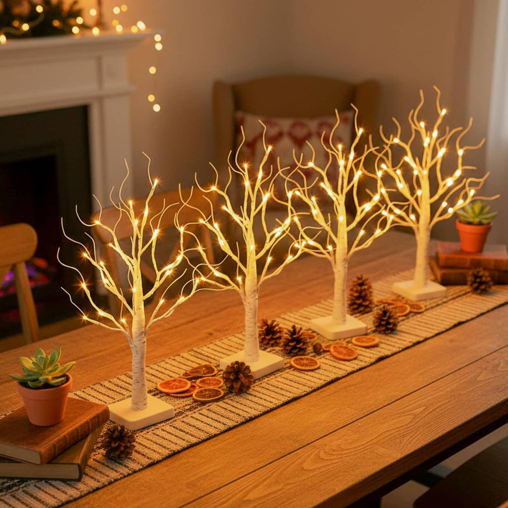 Set of 4 lighted birch LED trees with warm white lights on white square bases