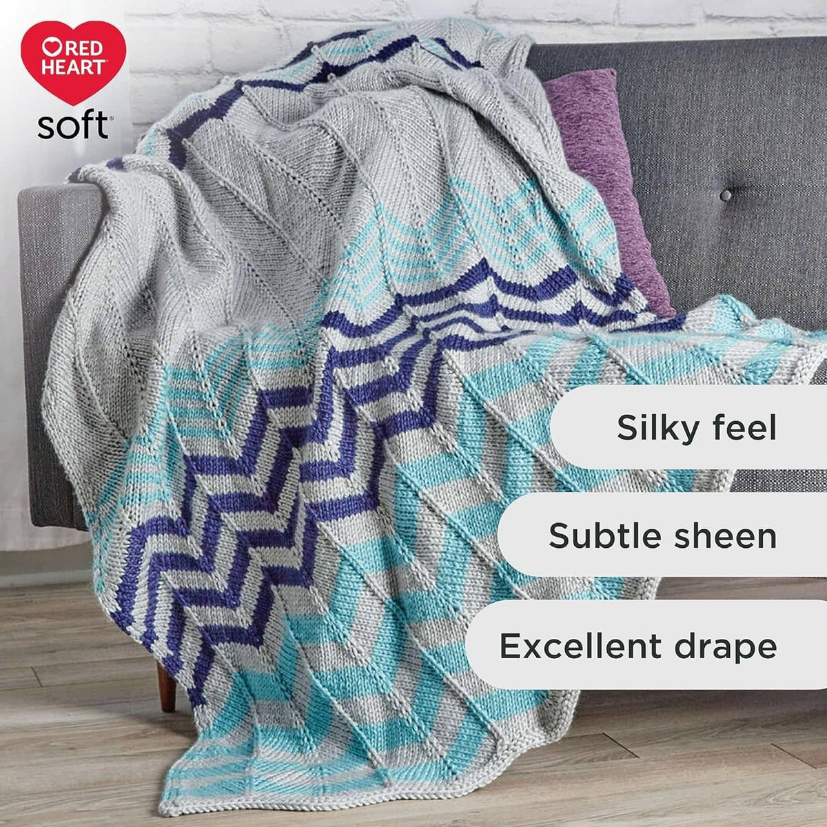Zigzag knit throw blanket in gray, blue, and purple with Red Heart soft logo
