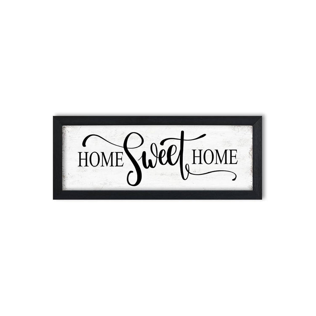 Wall sign with black frame and “HOME Sweet HOME” typography on white background