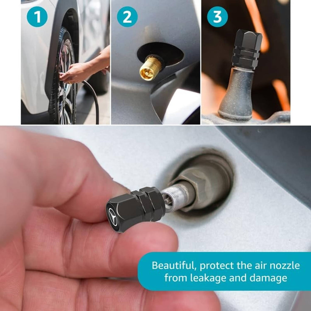 Black metal tire valve stem cap being installed by hand on a car wheel valve