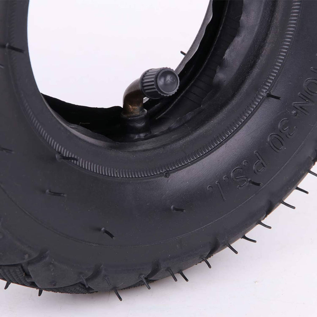 Tire with inner tube valve and thick sidewall, close-up of valve stem