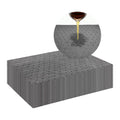 Gray oil absorbent pads with perforated surface, layered stack for cleaning spills