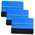 Felt edge squeegee tool with blue handle and black felt pad, angled scraping edge