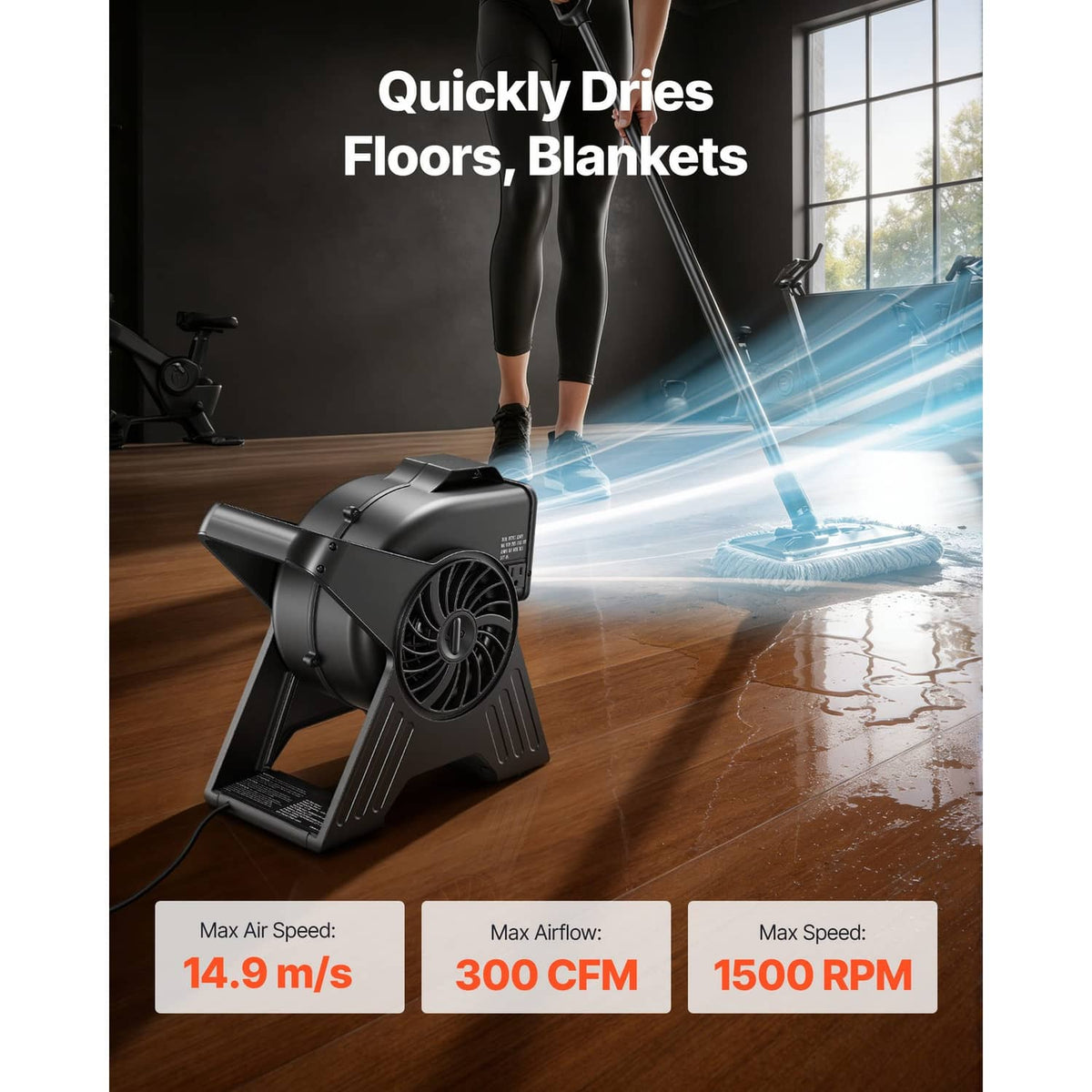 Portable utility fan blowing air across a wooden floor, black fan on stand