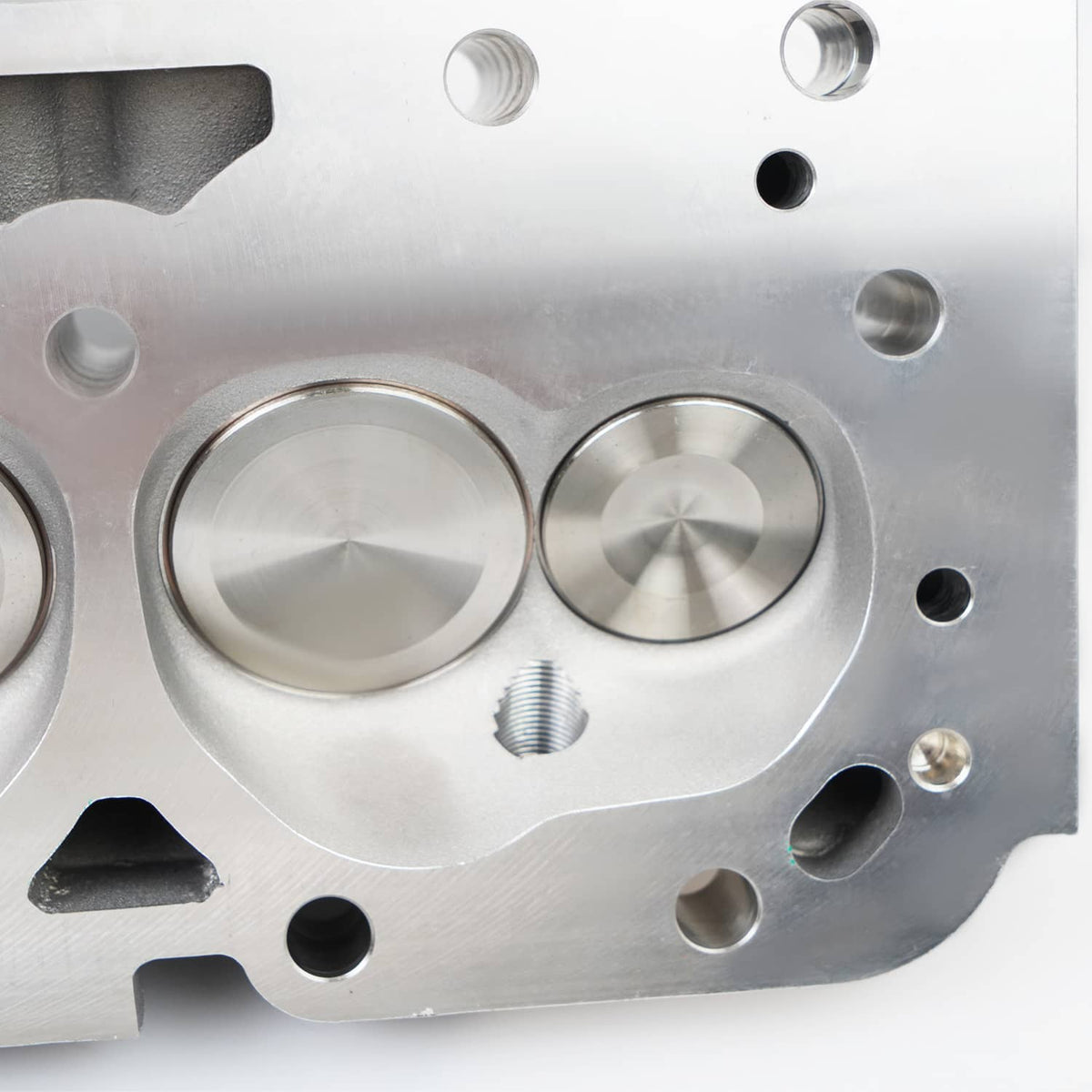 Aluminum cylinder head combustion chamber area with valve seats and bolt holes