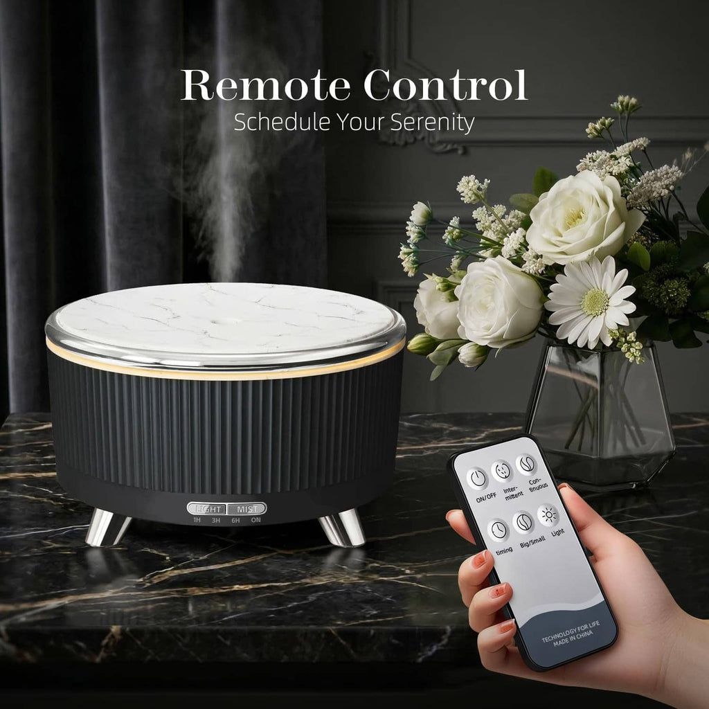 Black ultrasonic aroma diffuser with handheld remote control for mist and light settings