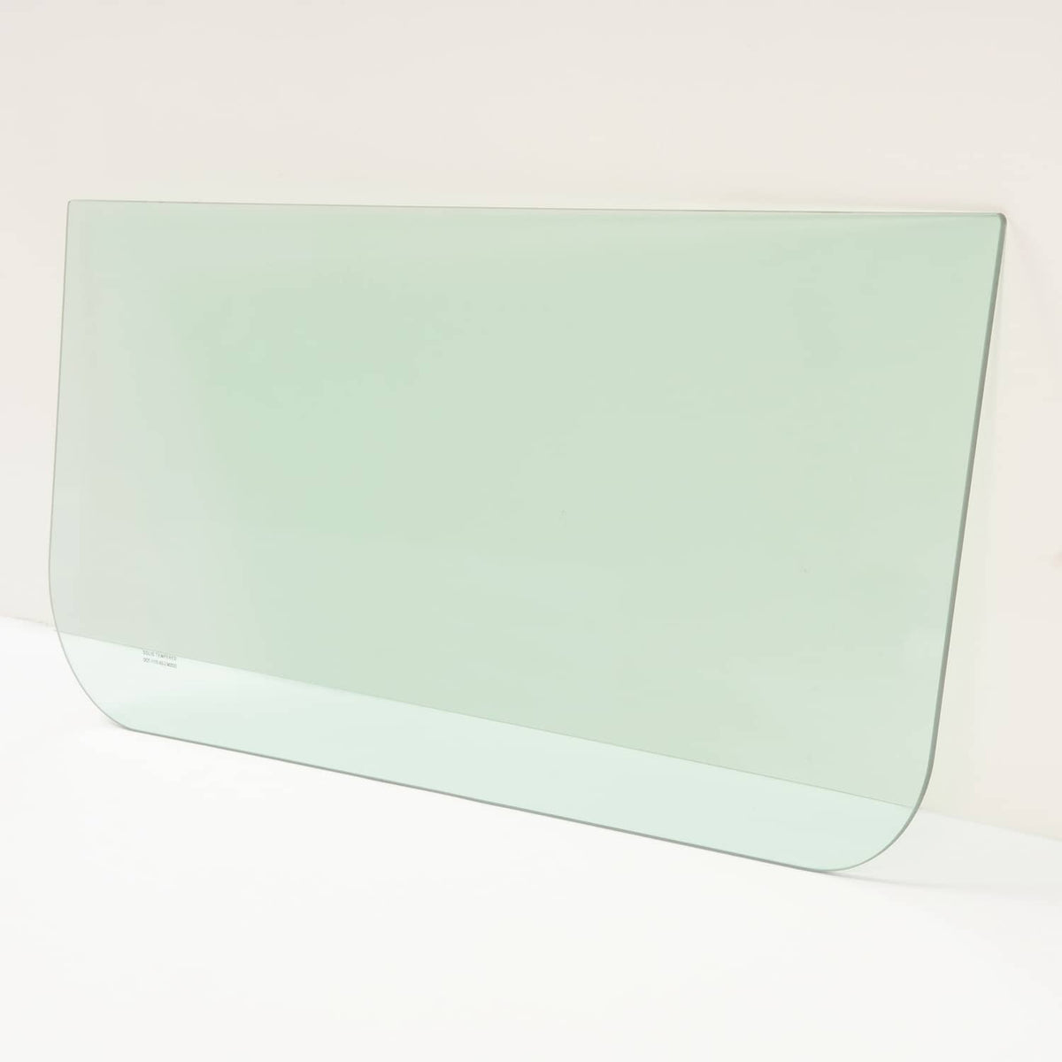Mint green tinted glass window panel with rounded bottom corners