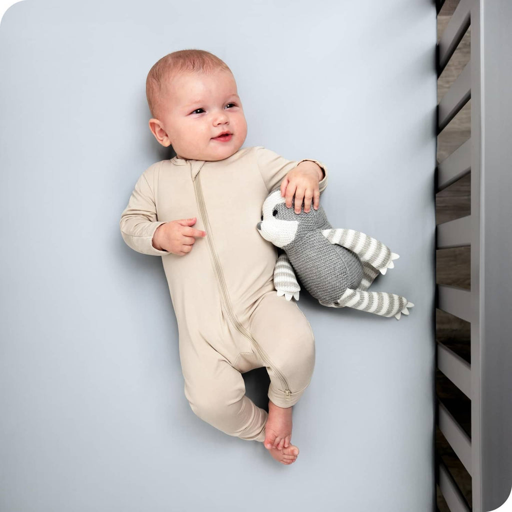 Light sky blue fitted crib sheet with smooth, flat surface