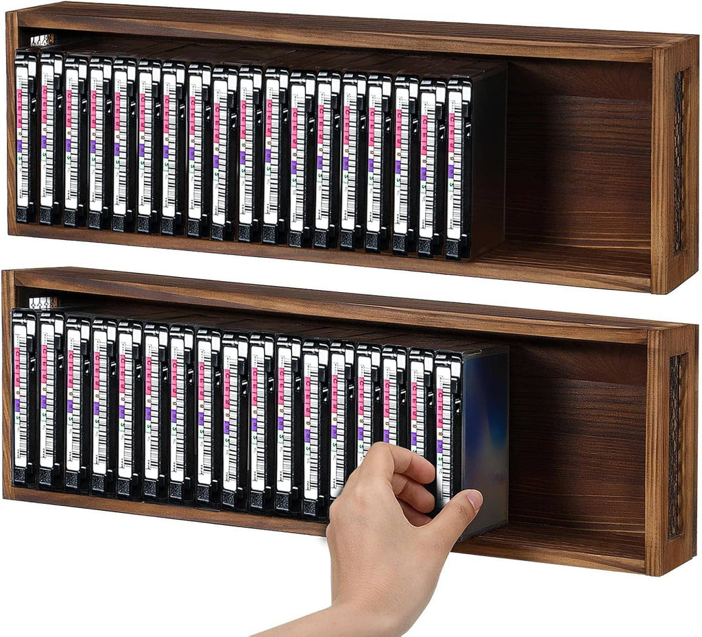 Wooden cassette tape storage cabinet with open front, holding multiple cassette tapes