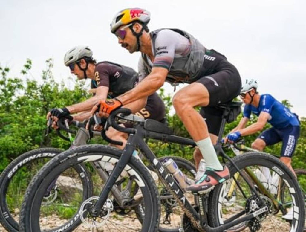 Bike tire sealant featured on a road cycling group riding outdoors
