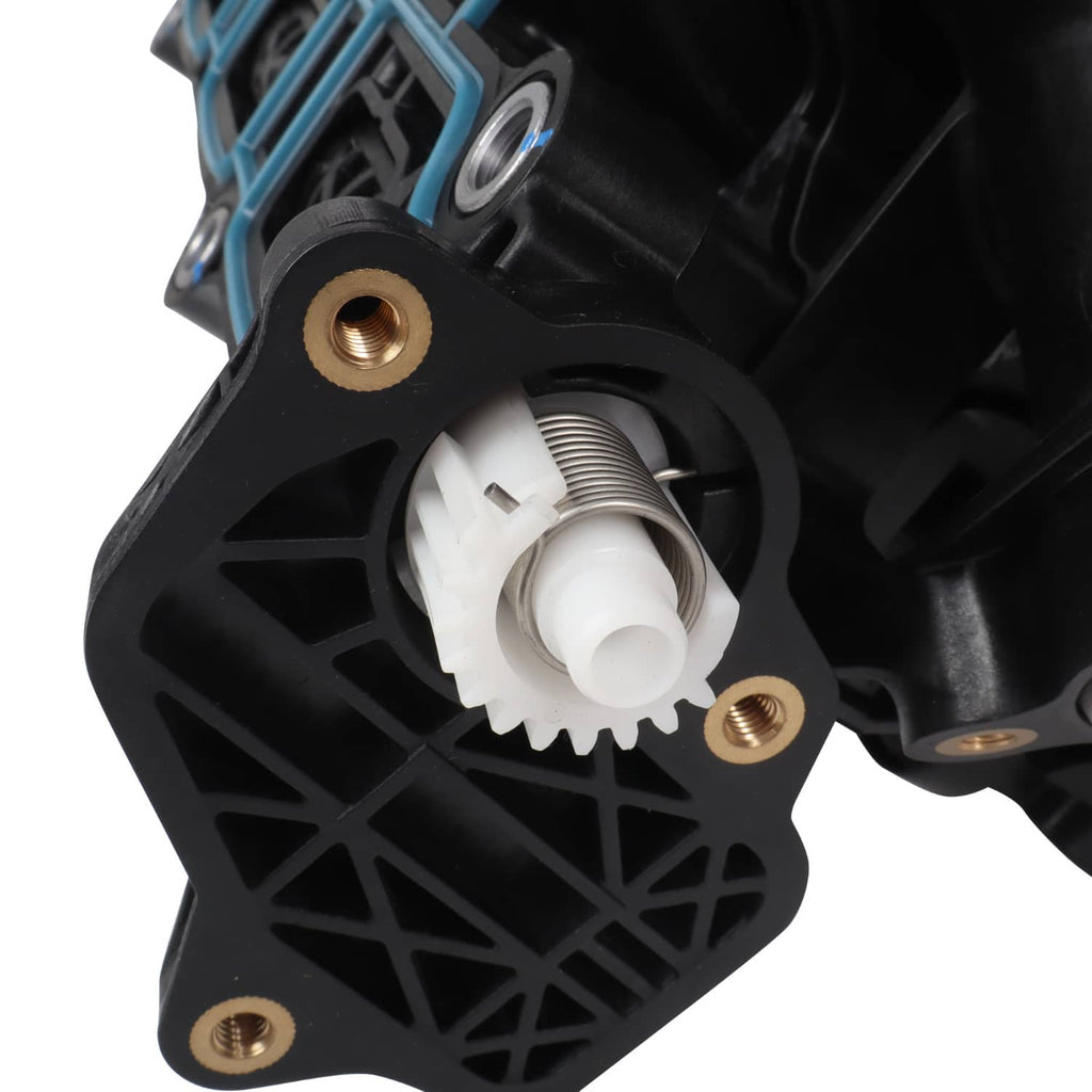 Air intake manifold close-up of white plastic connector with threaded mounting points