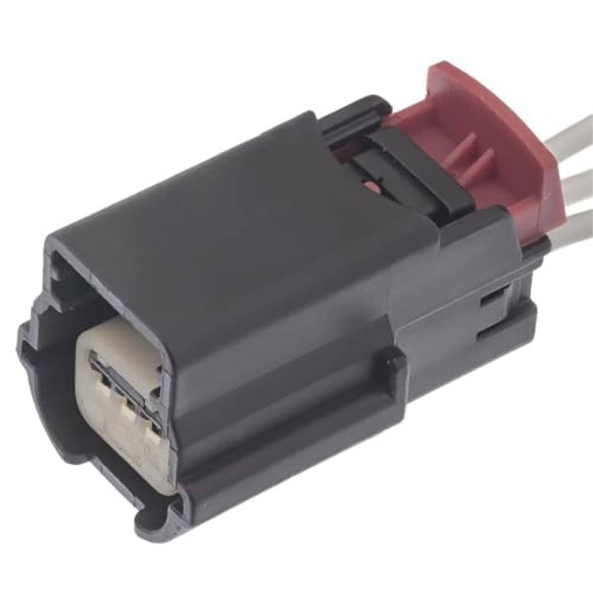 Crankshaft sensor electrical connector plug with red insert, black housing, and two pins