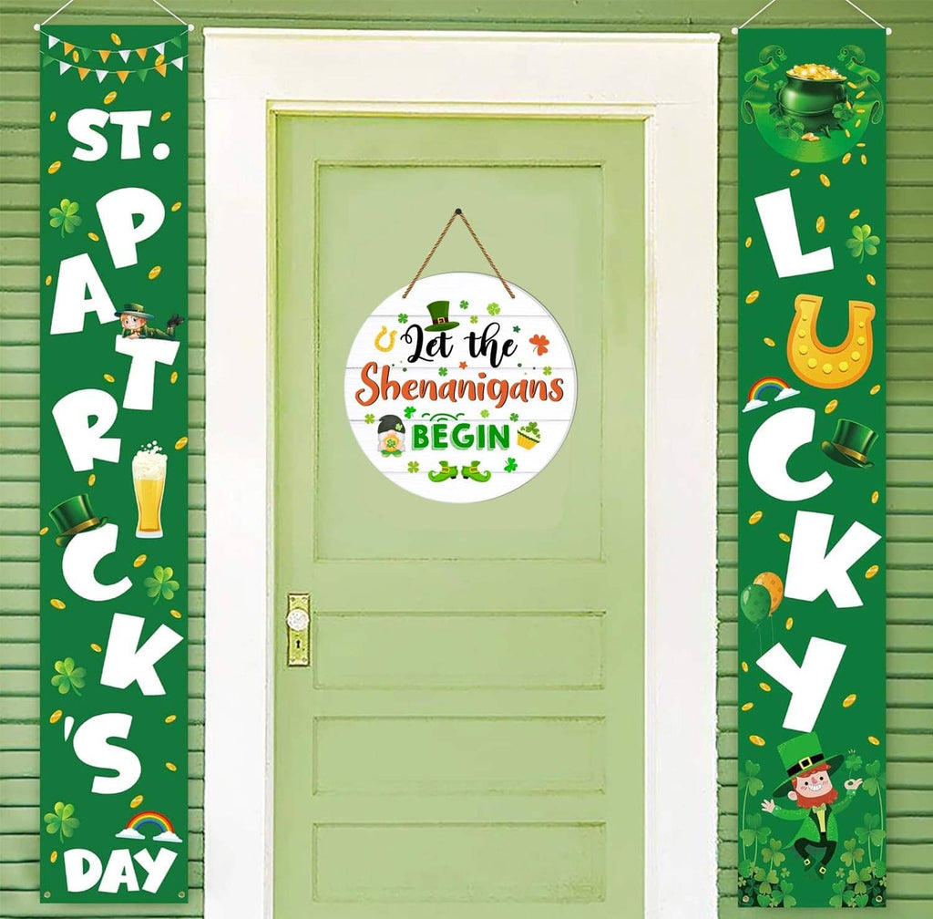 Round hanging door sign in center with “Let the Shenanigans Begin” print