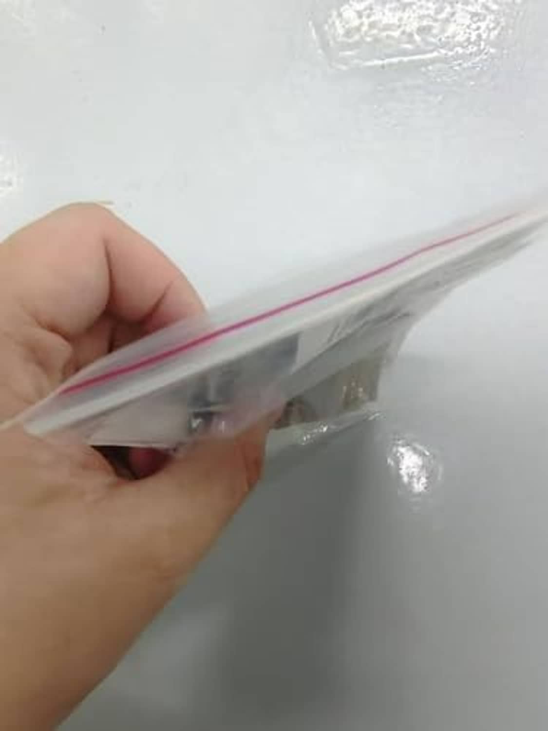 Mini gold and silver letter sticker set in sealed plastic bag