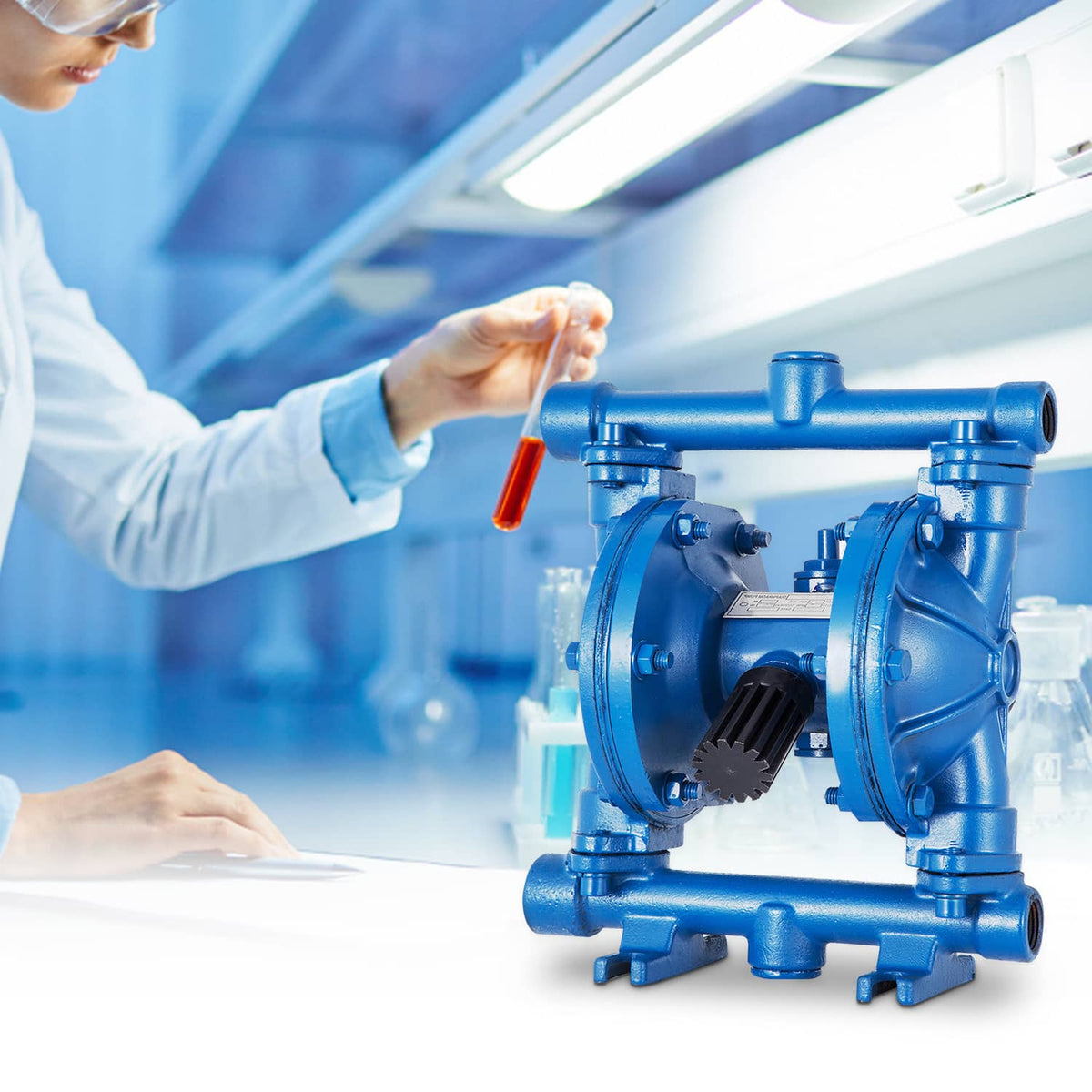Blue double diaphragm pump on display with person holding a test tube in a lab setting
