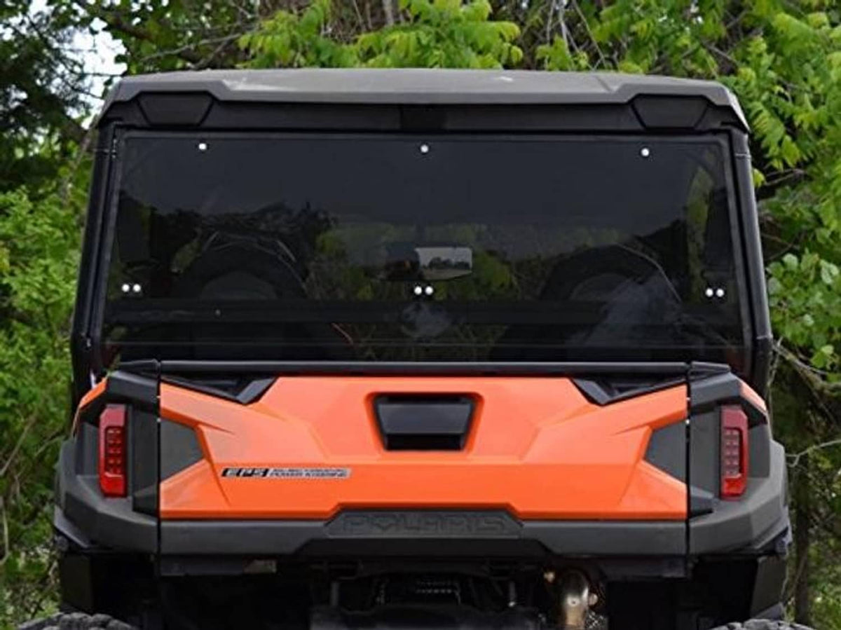 Dark-tinted rear windshield panel with black surround on the UTV rear cab