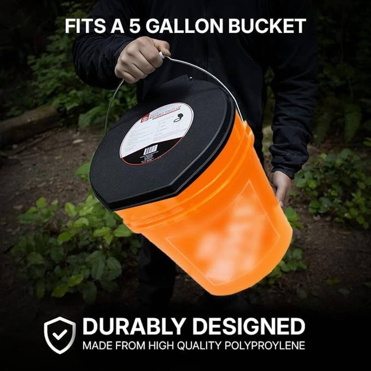 Black toilet lid on an orange bucket with hinged open seat cover