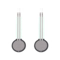 Thin film pressure sensor pair with two round black discs and two white lead wires