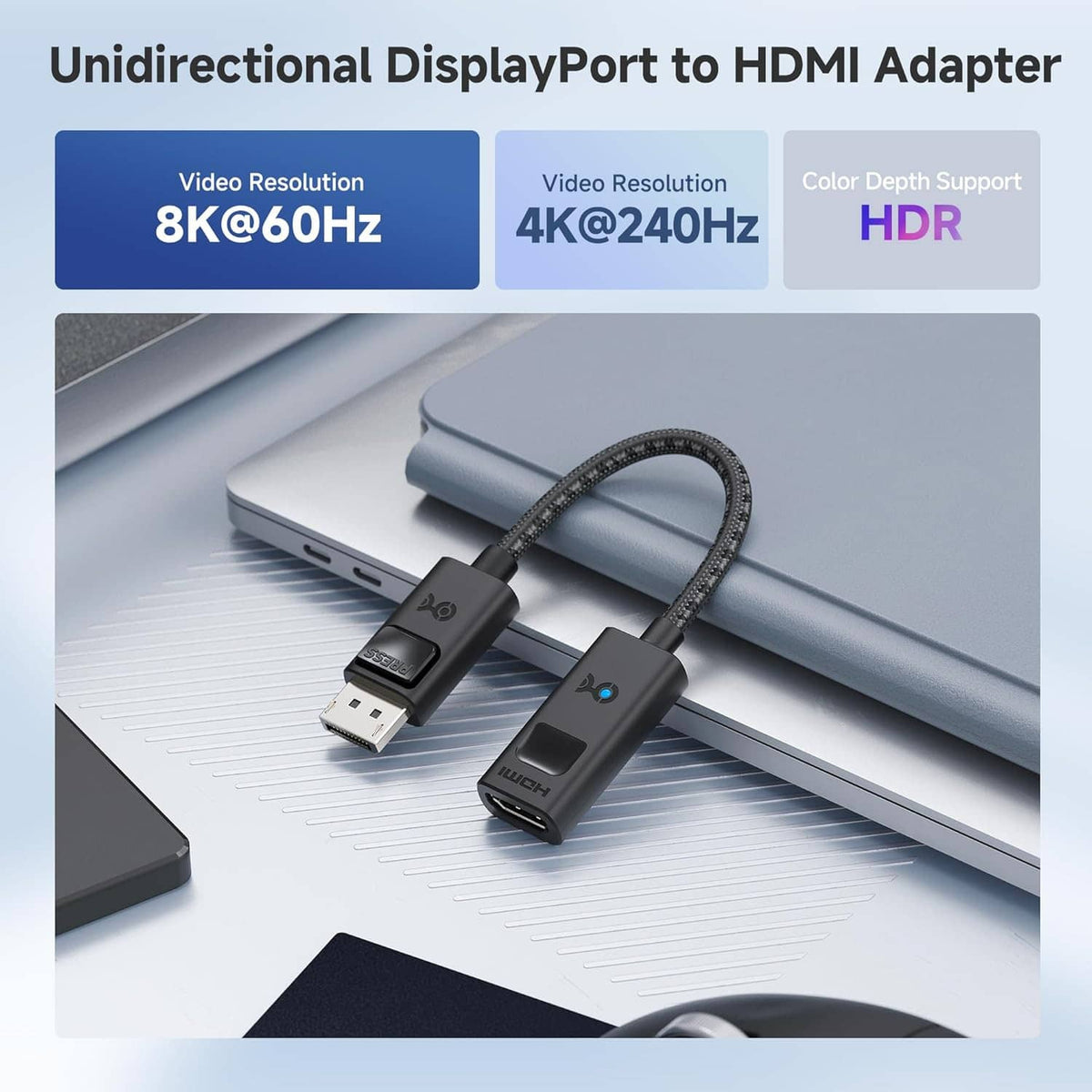 DisplayPort to HDMI adapter on braided cable, black connectors with small blue LED.