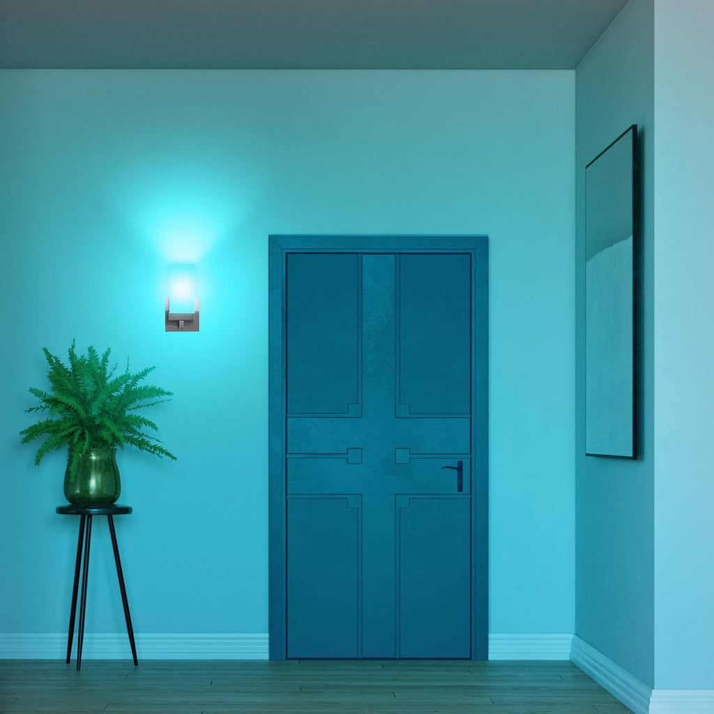 Color-changing smart bulb light creates a blue glow near a doorway