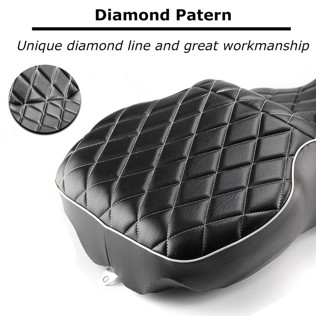 Black motorcycle seat with diamond pattern quilting and light piping edges