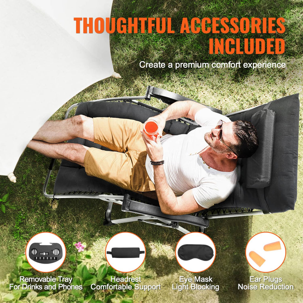 Black zero-gravity recliner chair with removable tray and headrest cushion.