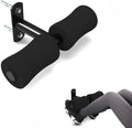 Wall mounted sit-up bar with black foam foot holders and metal mounting bracket.