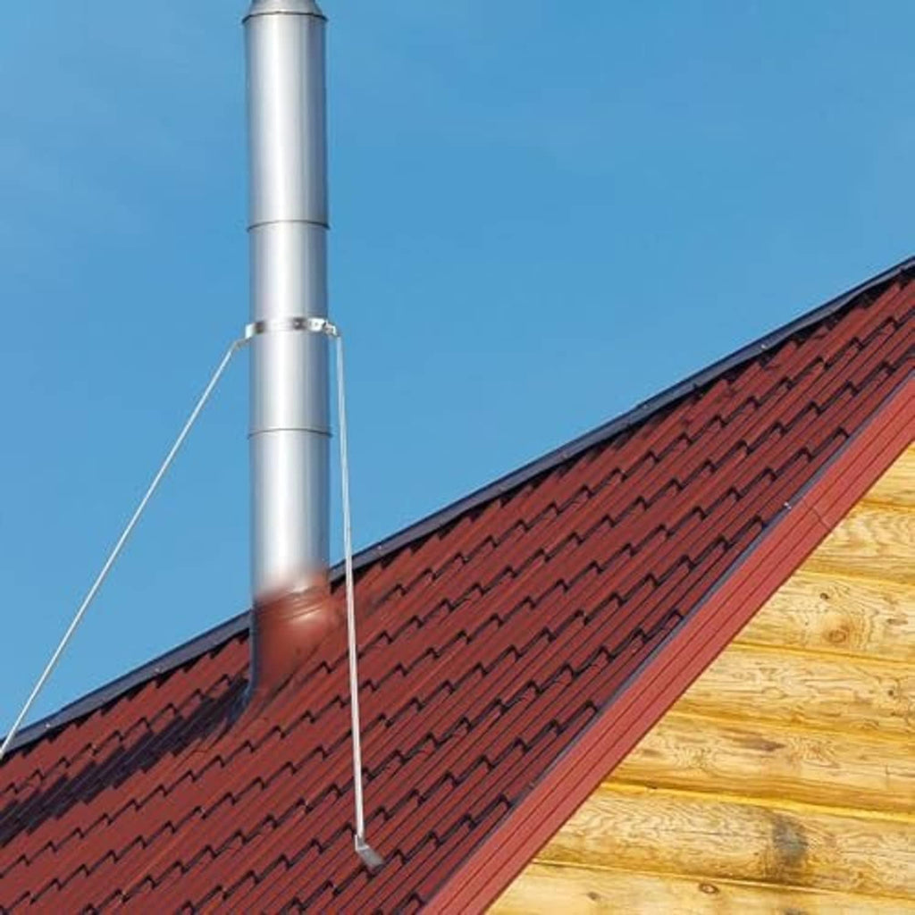 Stainless steel stove pipe roof support bracket kit installed on red shingle roof