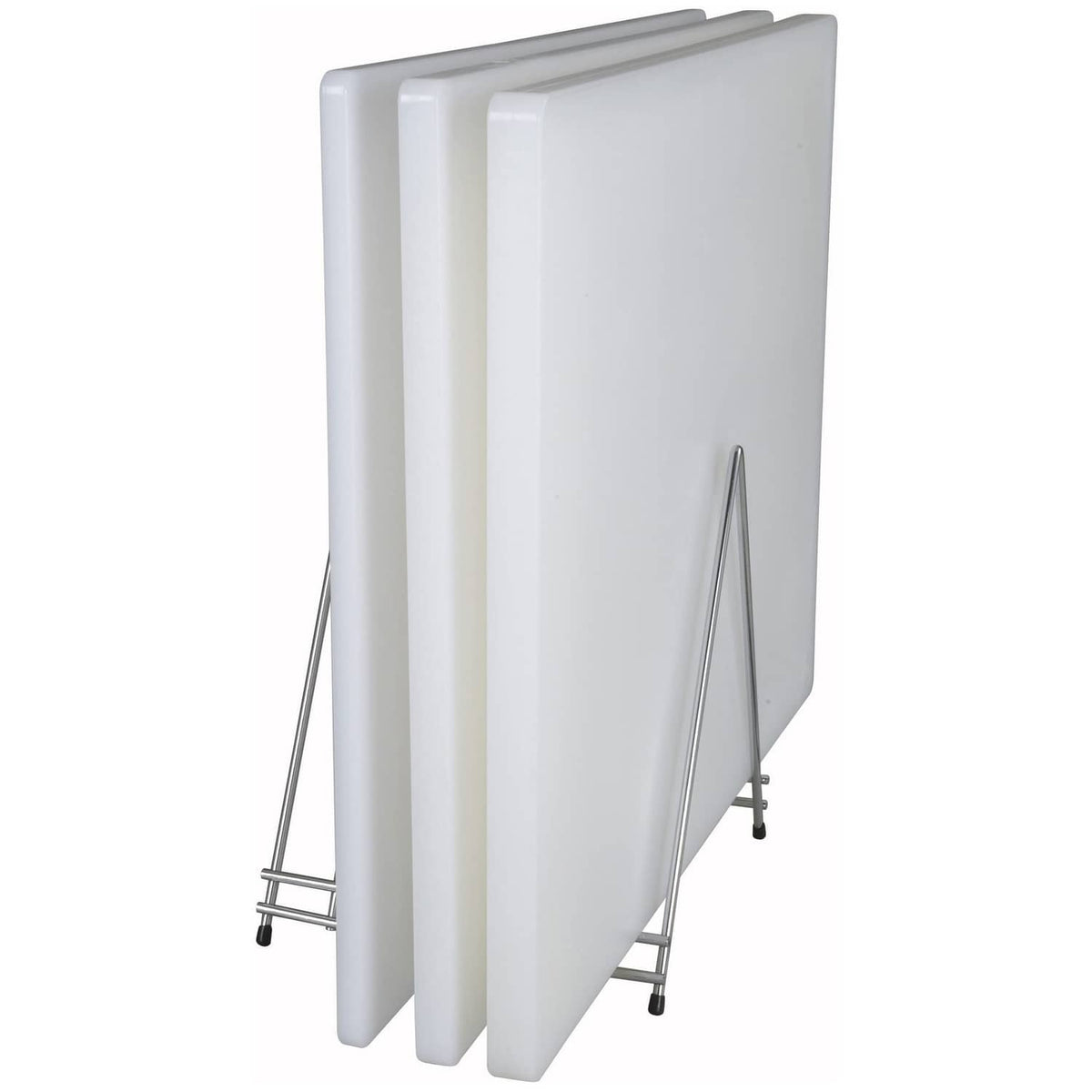 Stacked white plastic cutting boards on metal stand, side view