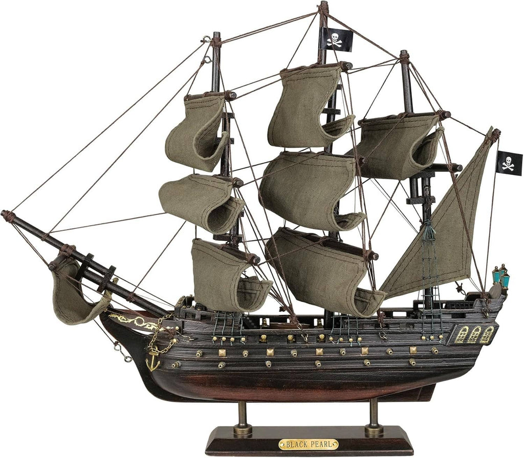 Wooden pirate ship model with dark hull, olive sails, and “Black Pearl” nameplate on stand