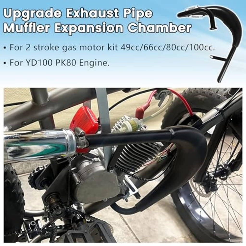 Black exhaust muffler expansion chamber pipe with hardware installed near the engine
