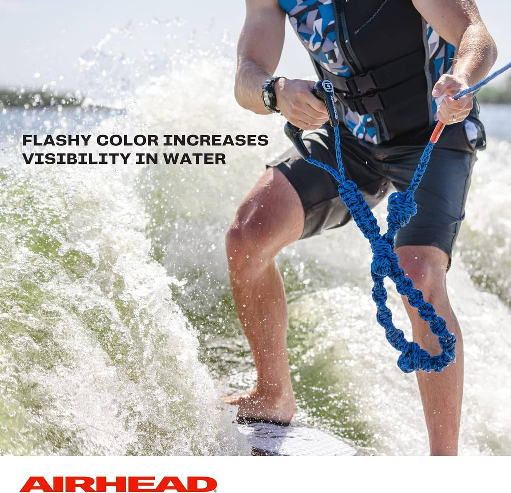 Blue braided wakesurf rope with coiled loops in use