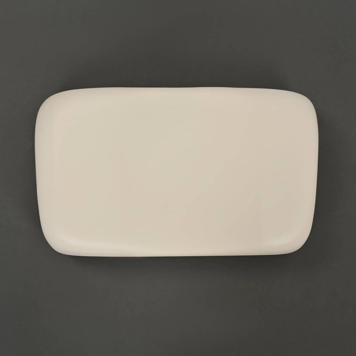 Off-white golf cart seat back cushion, rounded rectangle