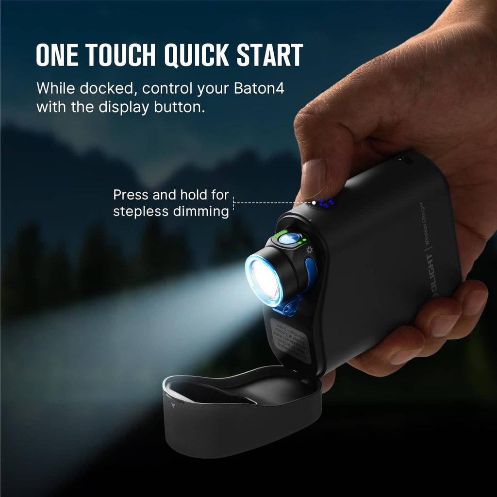 Black flashlight in hand with one-touch control near charging base