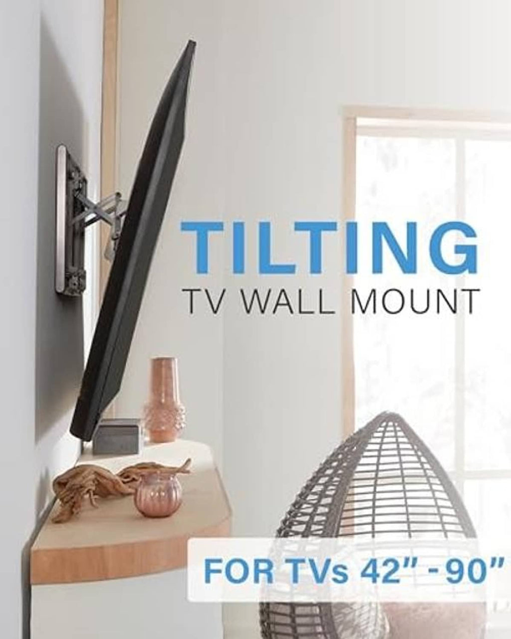 Black tilting TV wall mount installed on wall with TV bracket angled outward