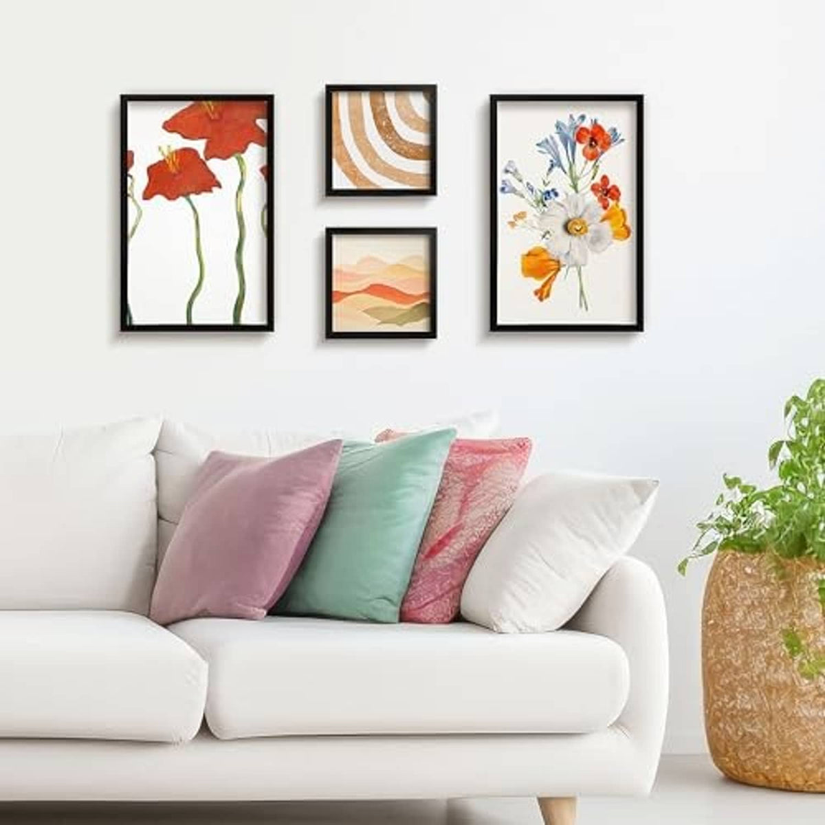 Black picture frames arranged on a wall for poster-style art display